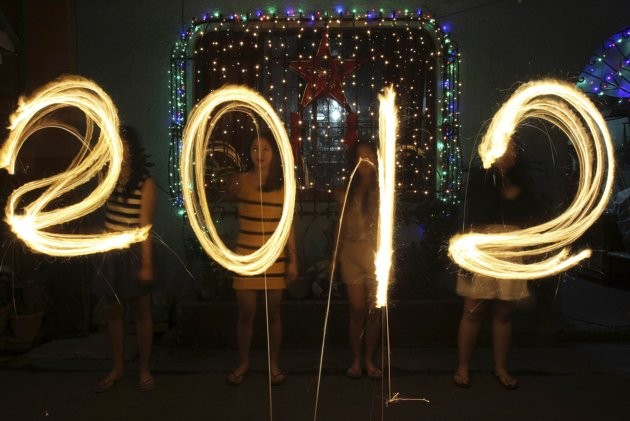 211588-women-use-sparklers-to-draw-2012