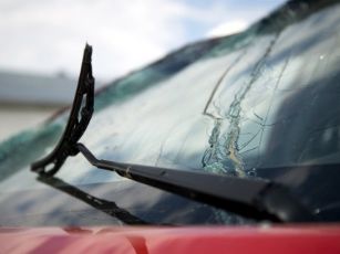 broken-windshield-wiper-on-a-broken-car-window