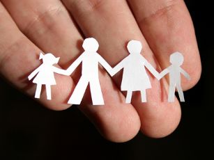 bigstock-paper-family-on-hand-12963788