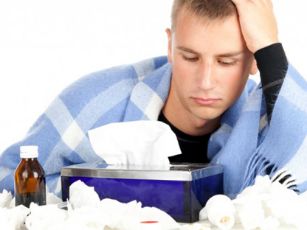 Young-man-sick-with-flu-via-Shutterstock-615x345