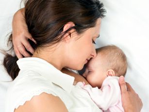 Oksana Kuzmina Breastfeeding shutterstock