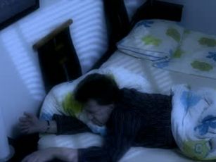stock-footage-a-man-can-not-sleep-he-looks-at-his-cell-phone-in-the-night